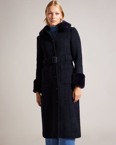 LYDDIIA-Outerwear-Introducing the ultimate cosy coat. LYDDIIA is your stylish shield against the elements. Slip into the regular fit adorned with faux fur cuffs and collar for an extra touch of glam. The button fastening and belted waist create a chic silhouette, while pockets keep your hands toasty. Longline coat Regular fit Faux fur cuffs and collar Button fastening Belted waist Pockets Jara is 5'10.5" / 1.79m and wears Dark Blue in a Ted size 1- Ted Baker Romania